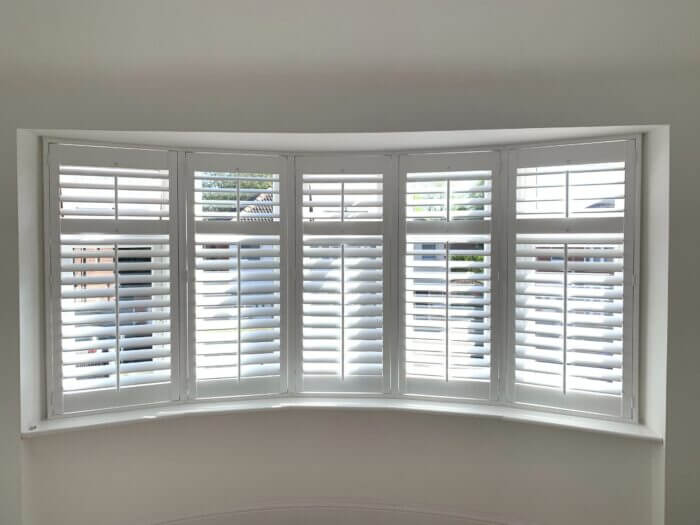 bay window bathroom shutters manchester 1 scaled 1